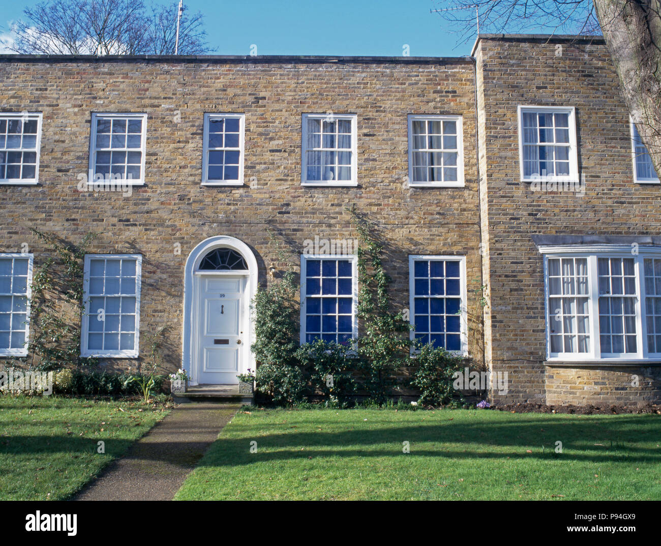 Newbuild doublefronted traditional townhouse Stock Photo Alamy