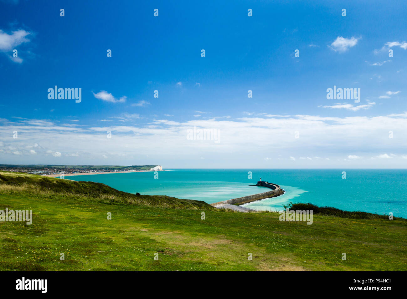Newhaven harbour and Seaford, East Sussex, England, UK, from the cliff top on Fort Hill. Stock Photo