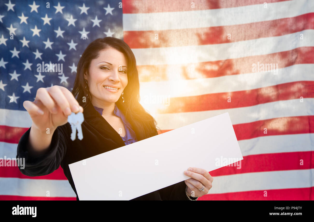 Hispanic Woman House Keys and Blank Sign In Front of American Flag ...