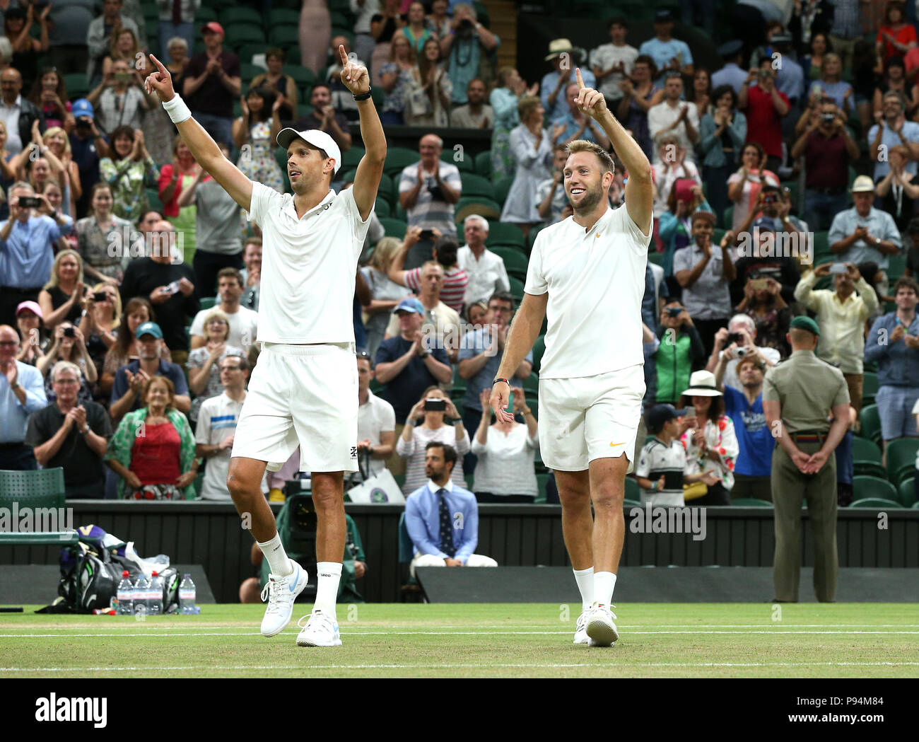 Mike Bryan and Jack Sock celebrate winning the Gentlemen's doubles final on day twelve of the
