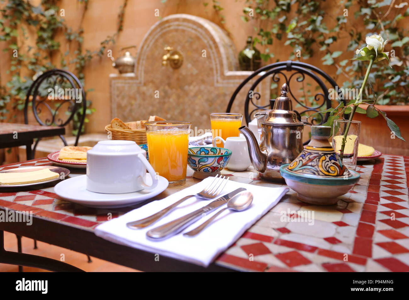 Delicious breakfast in Moroccan style served in riad (traditional Moroccan hotel) Stock Photo