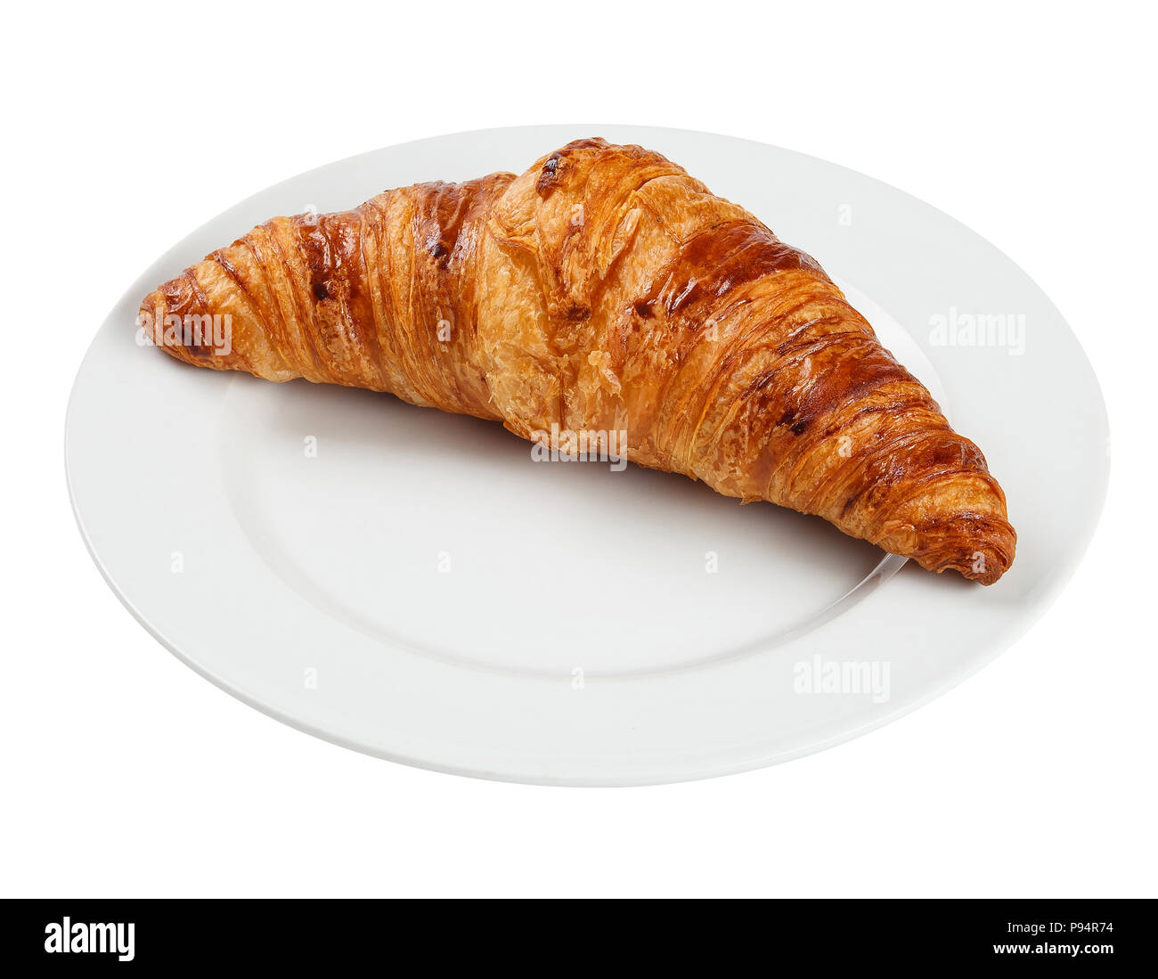 Croissant on plate isolated on white background. Include clipping path Stock Photo