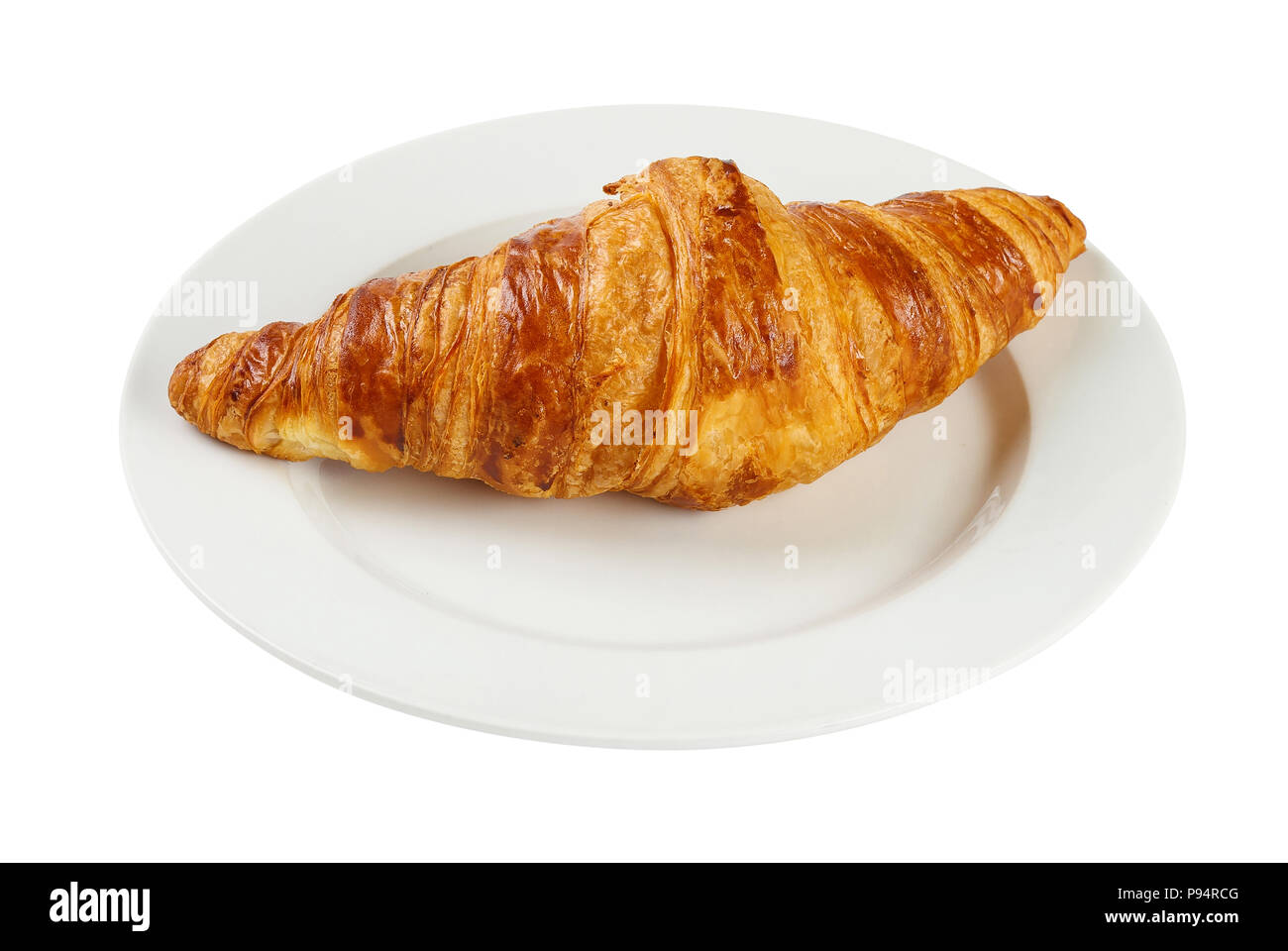 Croissant on plate isolated on white background. Include clipping path Stock Photo