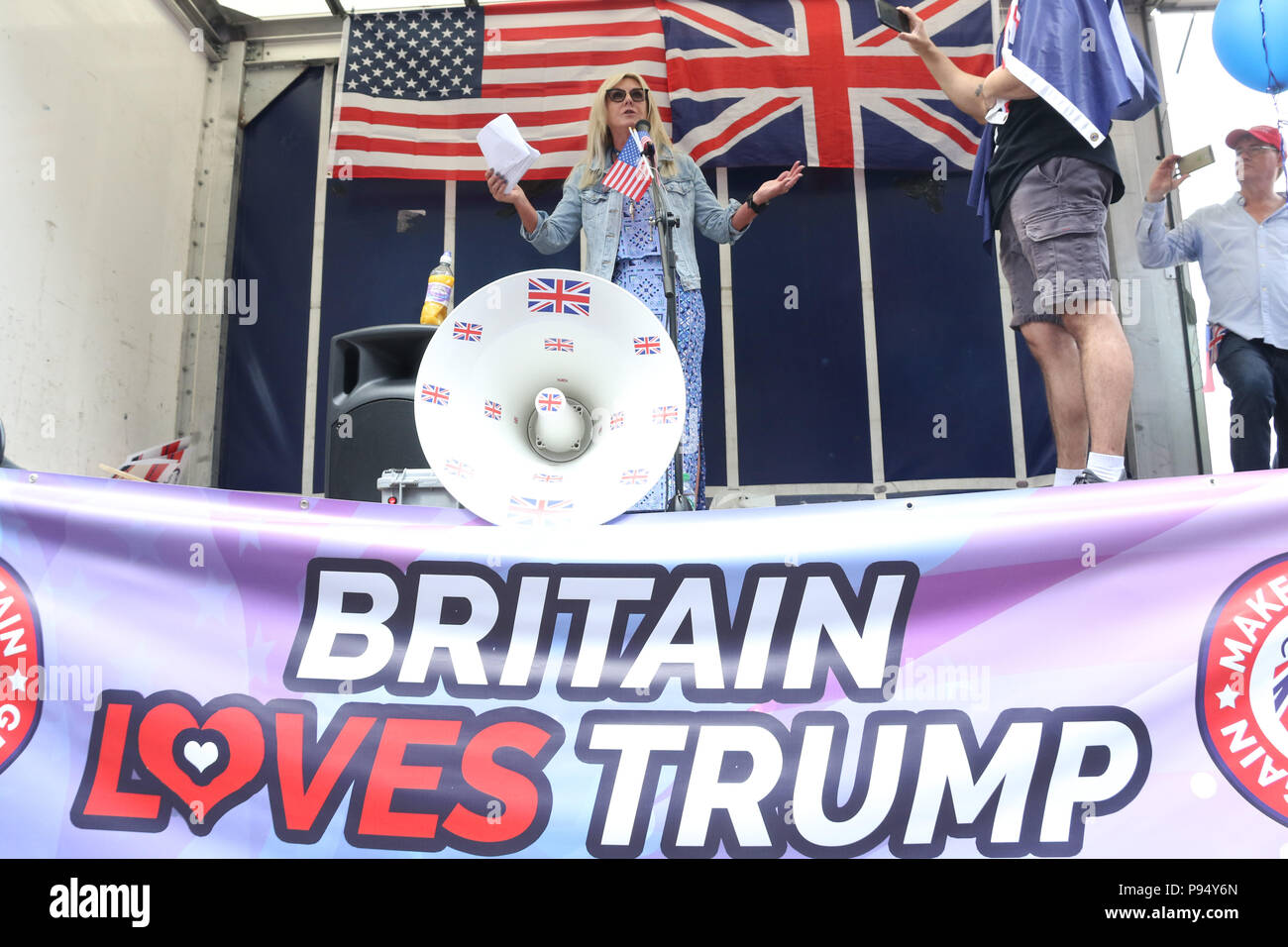London, England. 14th 2018. Pictured: Debbie Robinson (Australian Liberty Alliance). Despite police attempts prevent the pro-Trump protest due to fears of violence from far-left counter protesters, supporters Donald Trump