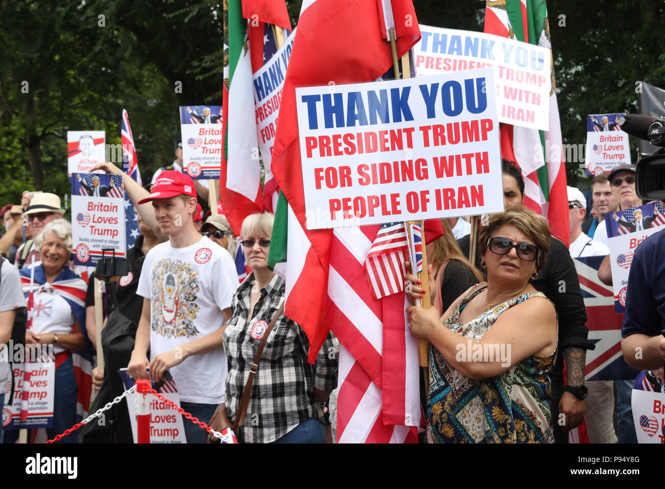 London, England. 14th July 2018. Despite police attempts to prevent the pro-Trump protest due to fears of violence from far-left counter protesters, supporters of Donald Trump assembled at midday outside the US Embassy in Vauxhall, London to welcome him on his visit to the UK. Credit: Richard Milnes/Alamy Live News Stock Photo