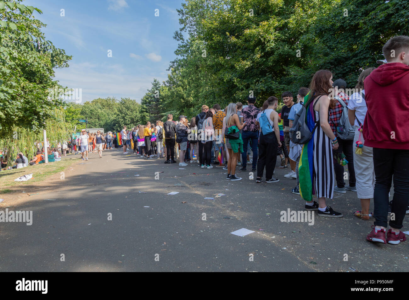 Glasgow, UK. 14th July 2018. Hours after Glasgow Gay Pride opened its doors many ticket holders are still unable to enter the venue. Many prepaid ticket holders are angered as the event sells out and they are forced to queue with non-ticket holders in the hope that they may get in. Many angry visitors to this year's event have taken to Twitter venting their frustration at the queues.  © Garry Cornes / Alamy Live News Stock Photo