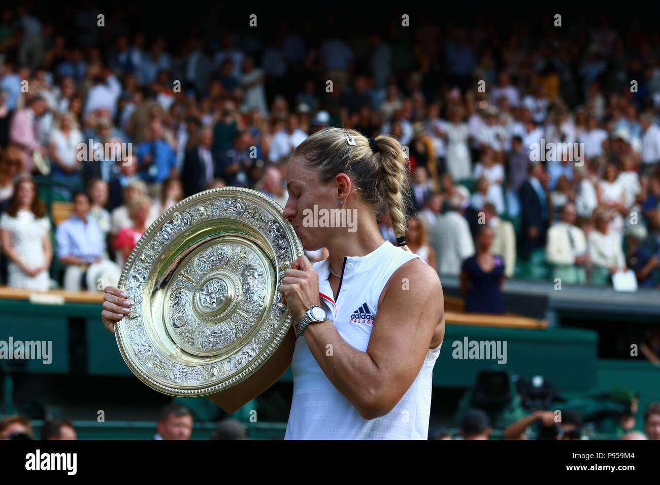 London, UK. 14th July 2018. Angelique Kerber celebrates with the trophy.  Ladies Finals Day, Day 12 Wimbledon Tennis The Championships, Wimbledon,  London, on July 14, 2018. Credit: Paul Marriott/Alamy Live News Stock Photo  - Alamy