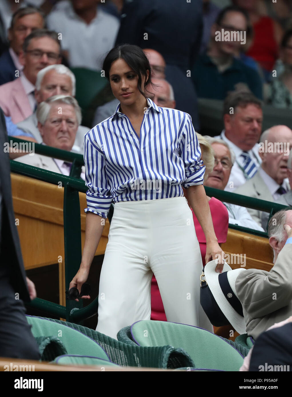London, UK. 14th July 2018. Meghan Markle, Duchess of Sussex, watching the  conclusion of the Rafael Nadal and Novak Djokovic match, before the Ladies  Final between Angelique Kerber and Serena Williams. Ladies