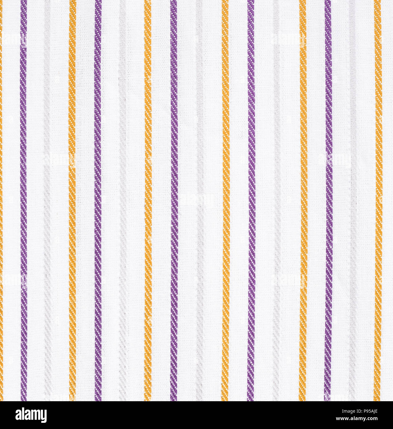 White fabric texture with orange and violet stripes pattern. Closeup Stock Photo