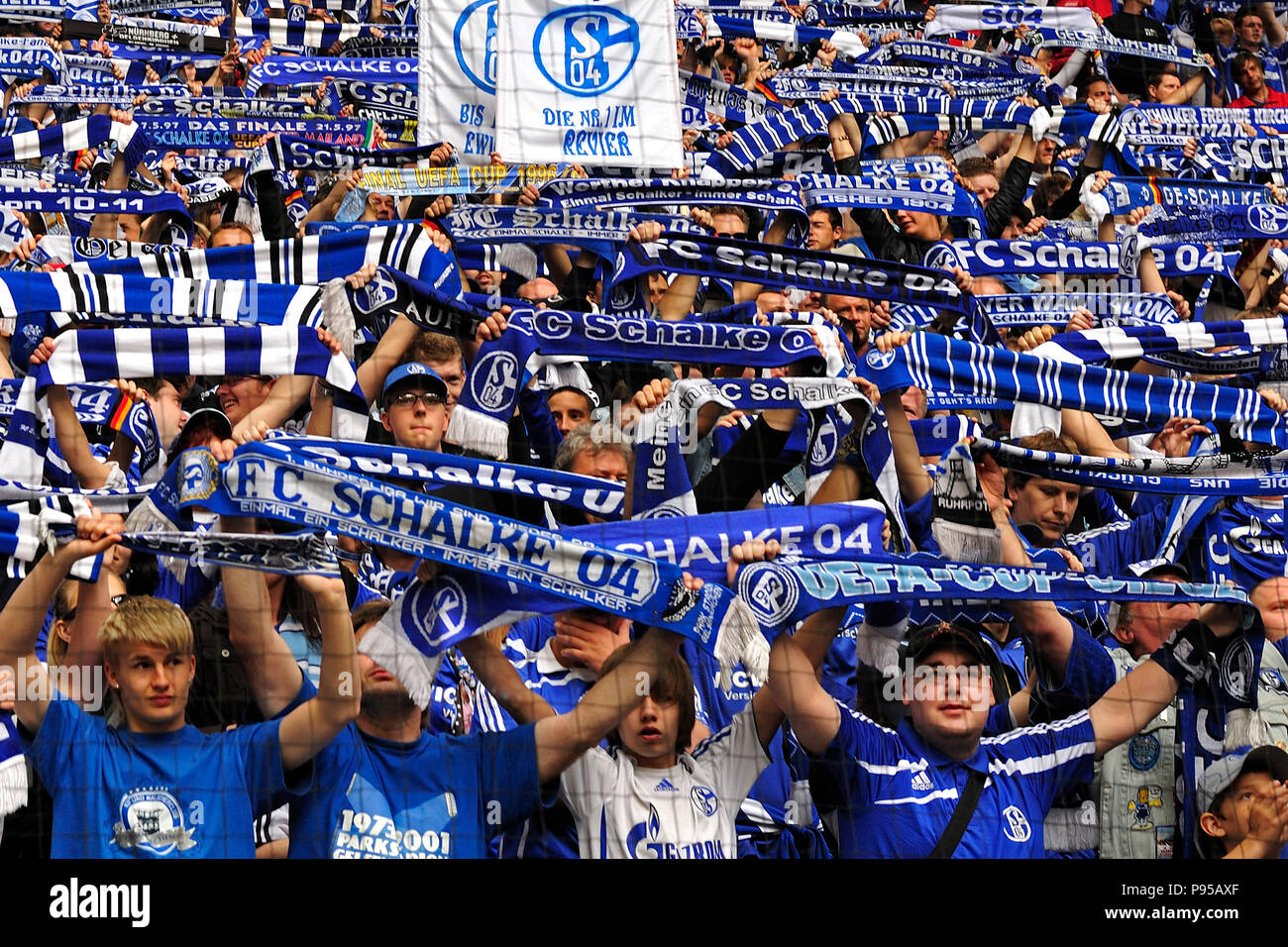 Germany, North Rhine-Westphalia - Football fans of FC Schalke 04 in the Veltins Arena Stock Photo