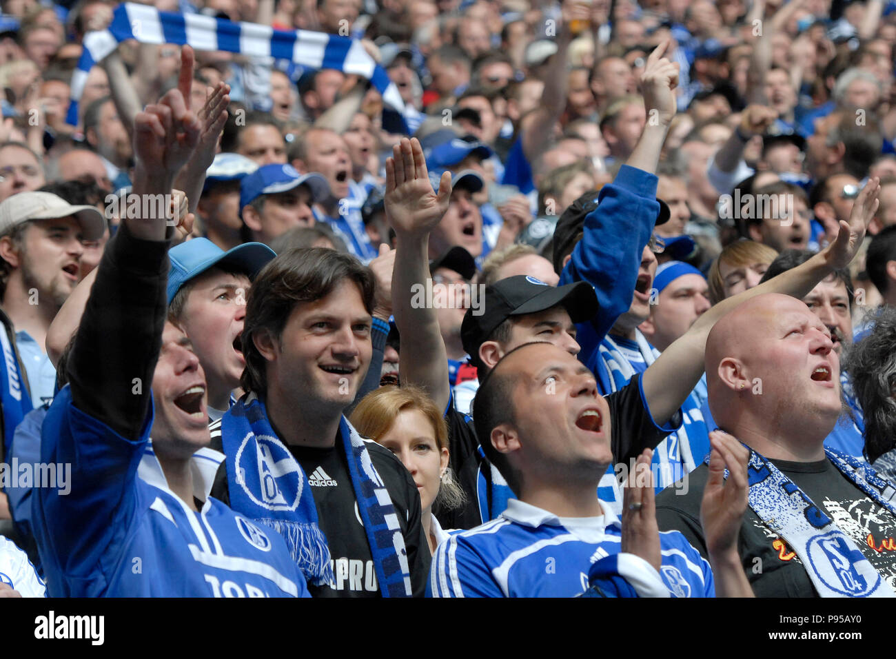 Germany, North Rhine-Westphalia - Football fans of FC Schalke 04 in the Veltins Arena Stock Photo