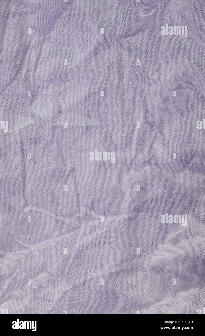 Violet wrinkled fabric texture. Closeup Stock Photo