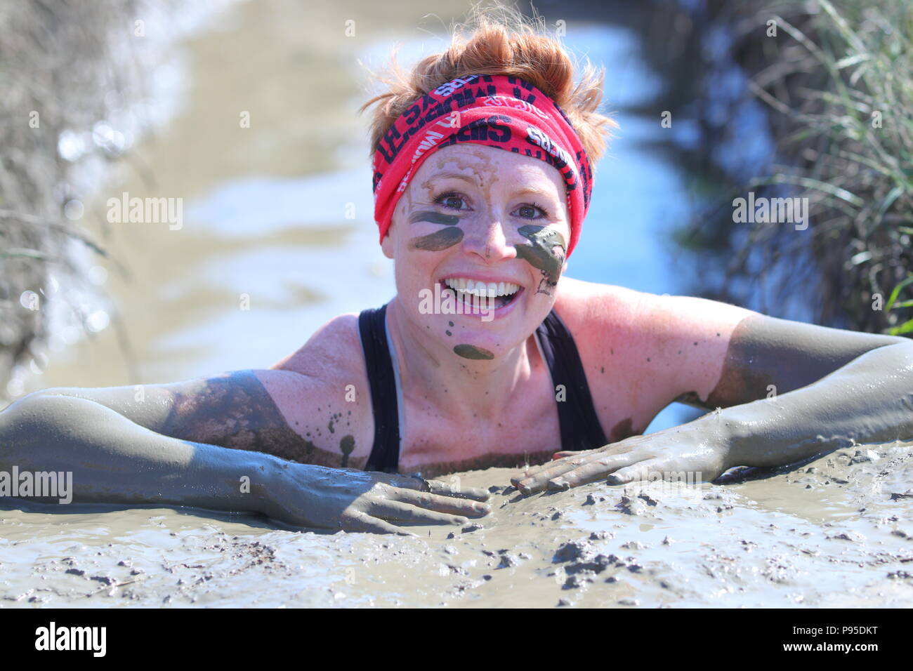 Woman obstacle race mud hi-res stock photography and images - Alamy