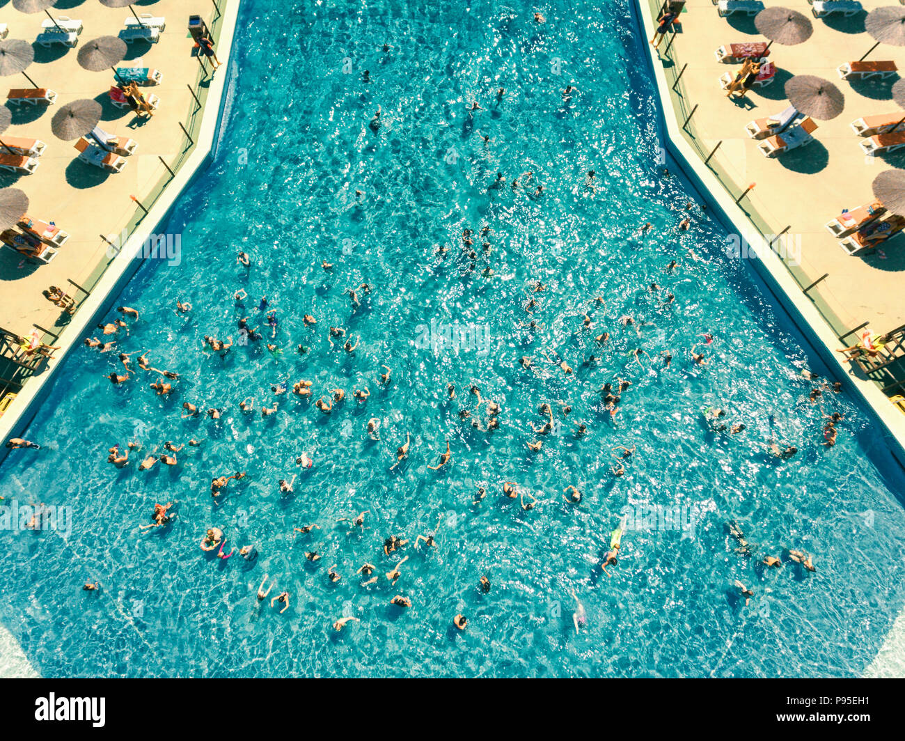 Crowded swimming pool Stock Photo