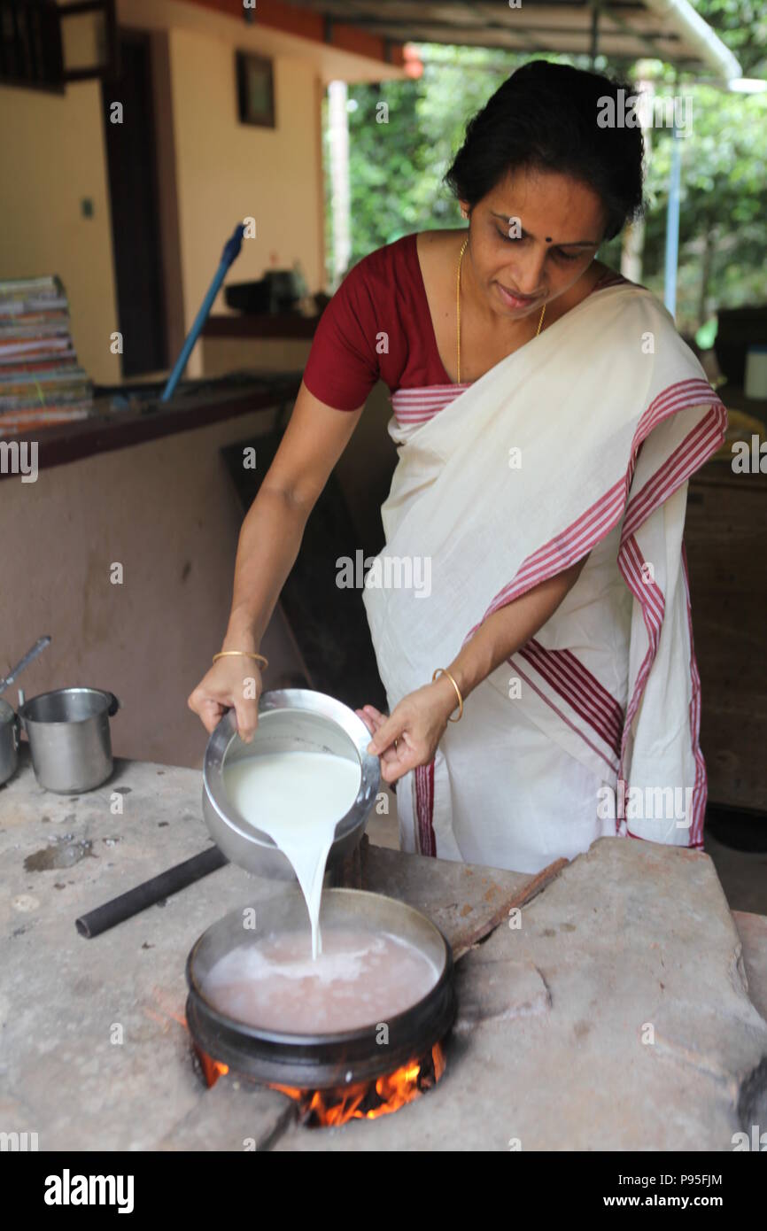 preparing kerala paal paayasam or milk porridge Stock Photo
