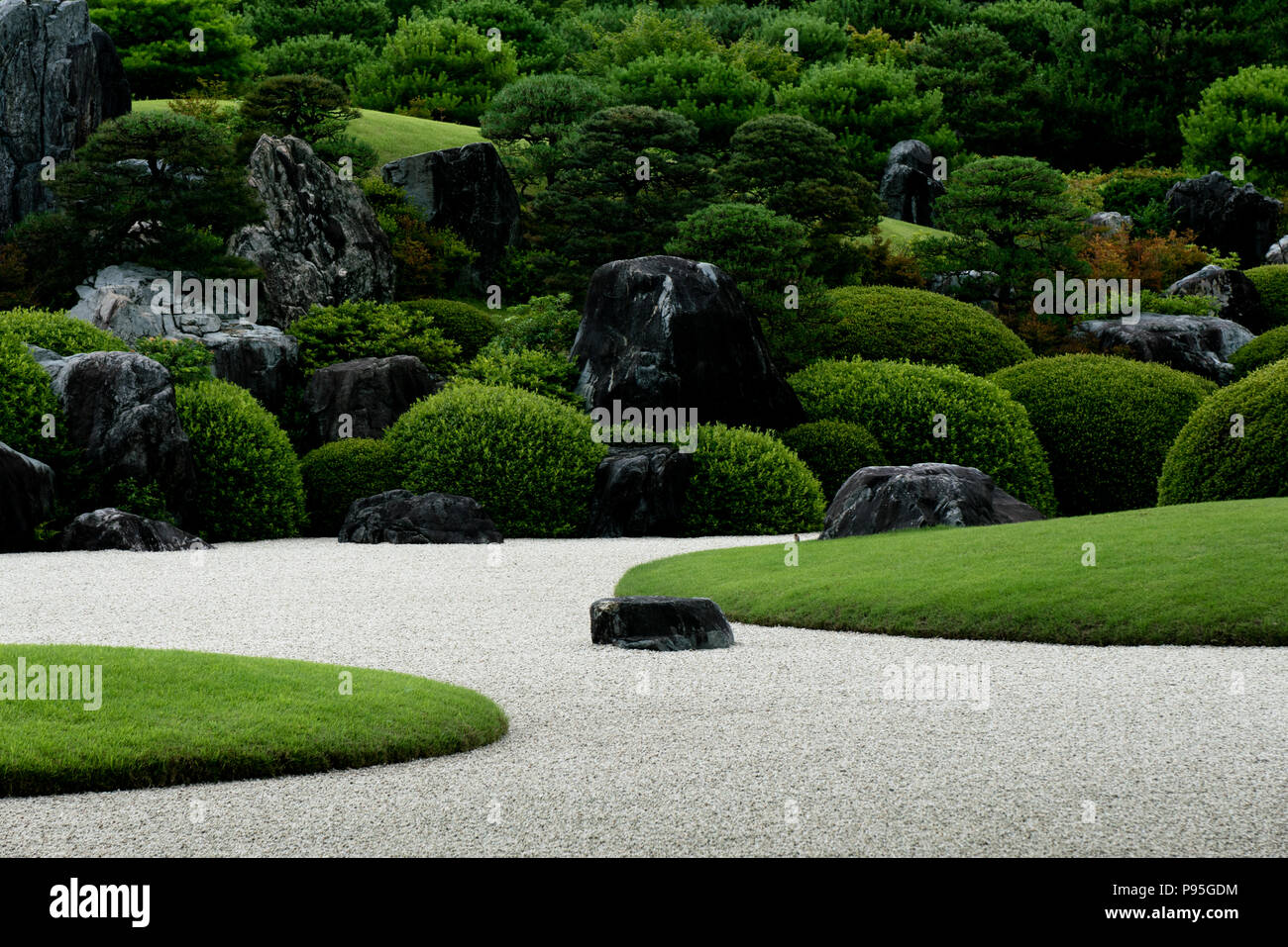 Designed by renowned gardener Kinsaku Nakane, Adachi Museum's garden is conceived as a painting or a living scroll to be viewed through windows only. Stock Photo