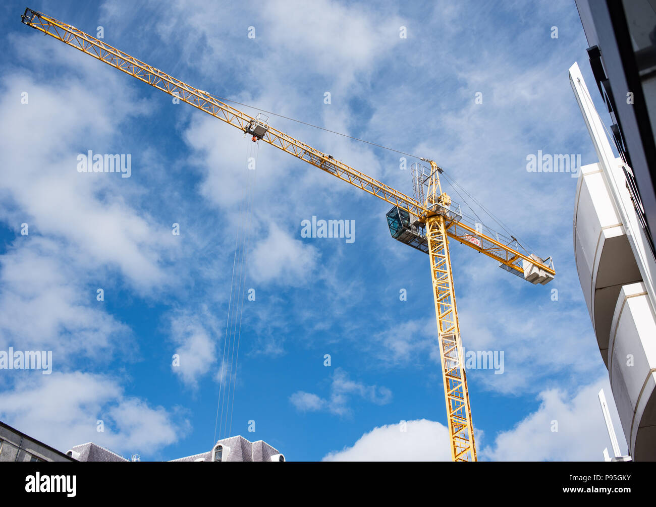 Tower crane against sky in Douglas centre Stock Photo