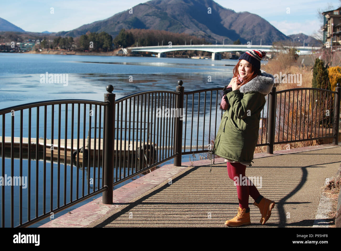 girl with funny face in front of the mt fuji Stock Photo