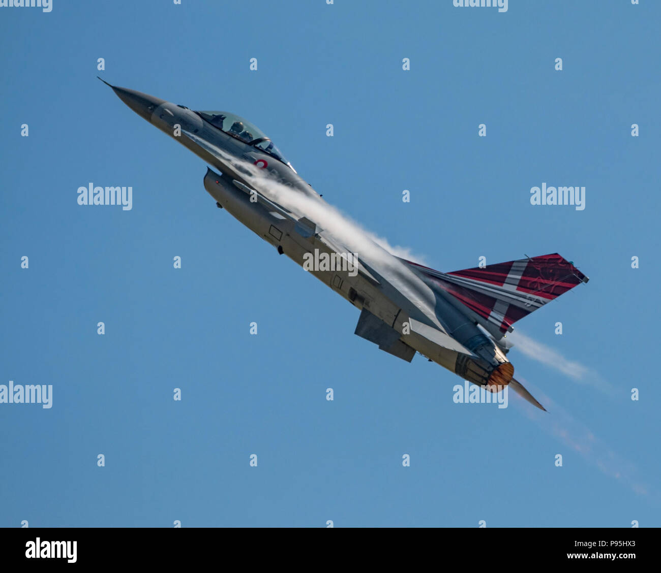 Royal Danish Air Force F-16 displaying in the blue sky above RNAS Yeovilton, UK during the International Air Day on 7/7/18. Stock Photo