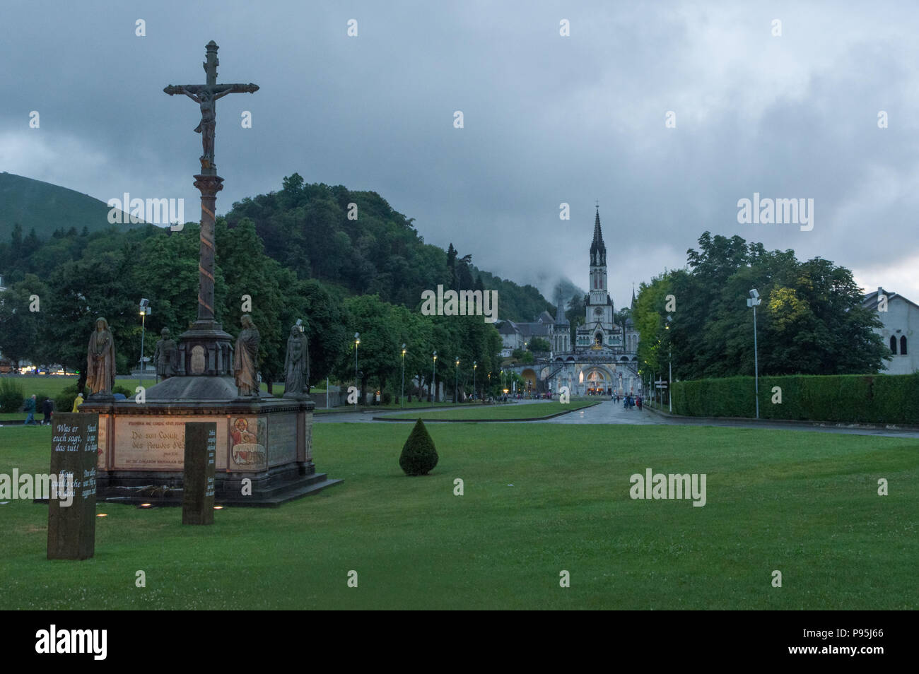 Lourdes, France (4th Juky 2018): panoramic evening view of the area of the Rosary Basilica  in Lourdes Stock Photo