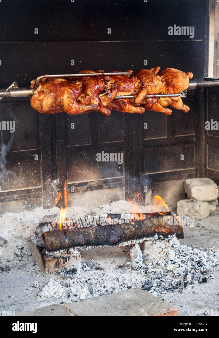 Roast chickens barbeque barbecue hires stock photography and images