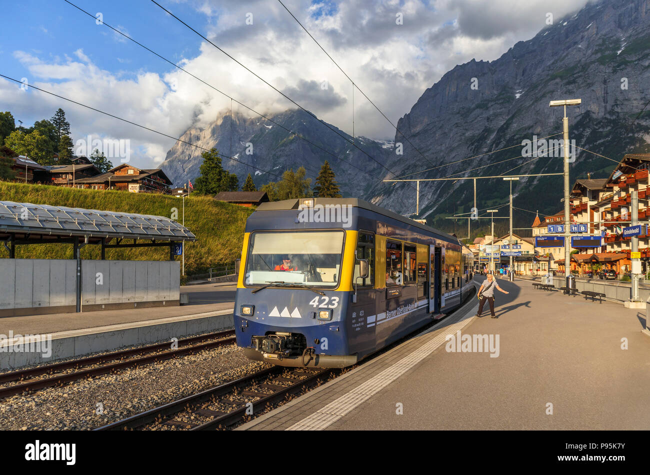 Berner Oberland Bahn (Bernese Oberland Railway) train to Interlaken Ost in Grindelwald station, Bernese Oberland, Switzerland Stock Photo