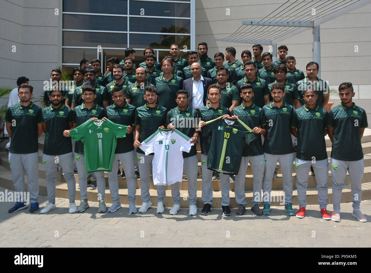 https://c8.alamy.com/comp/P95KM5/lahore-pakistan-15th-july-2018-pakistani-officials-brazilian-head-coach-jose-antonio-nogueira-coach-shahid-anwar-media-marketing-manager-shahid-khokhar-and-players-of-national-football-team-unveiling-the-kits-of-upcoming-event-during-a-press-conference-at-pakistan-football-federation-office-in-lahore-credit-rana-sajid-hussainpacific-pressalamy-live-news-P95KM5.jpg