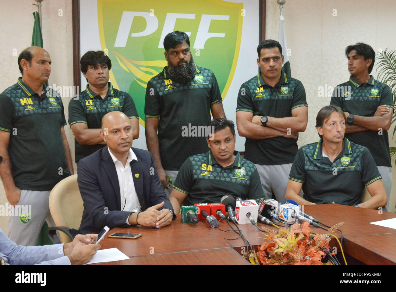 https://c8.alamy.com/comp/P95KMB/lahore-pakistan-15th-july-2018-pakistani-officials-brazilian-head-coach-jose-antonio-nogueira-coach-shahid-anwar-media-marketing-manager-shahid-khokhar-and-players-of-national-football-team-unveiling-the-kits-of-upcoming-event-during-a-press-conference-at-pakistan-football-federation-office-in-lahore-credit-rana-sajid-hussainpacific-pressalamy-live-news-P95KMB.jpg