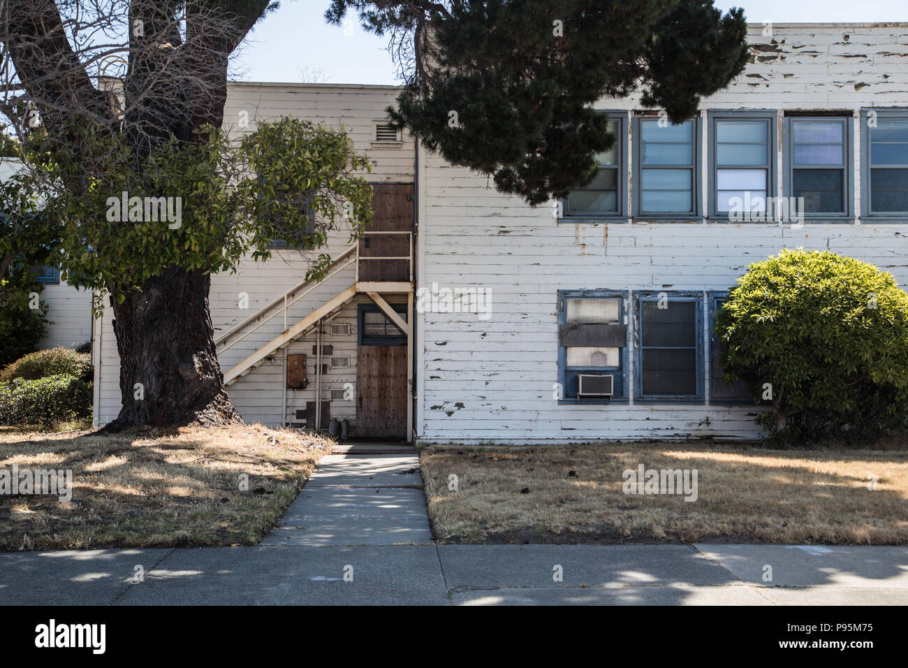 The abandoned building of the old Naval Air Station in Alameda, in the Bay Area, in the shade of