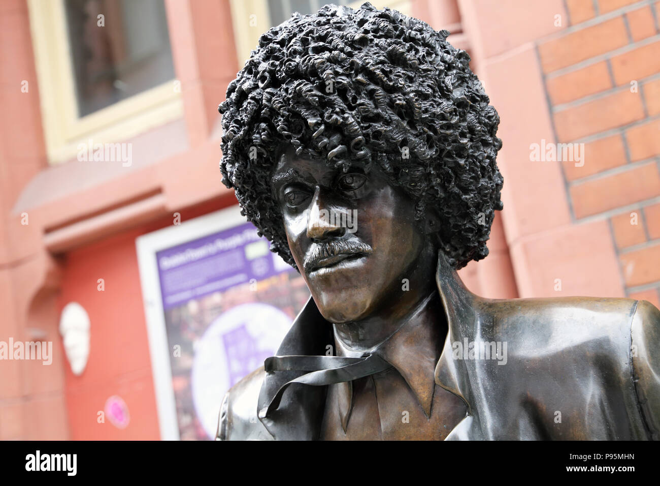 A close up view of the bronze statue of rockstar Phil Lynott memorializes the late singer and bassist of the band Thin Lizzy. Dublin, Ireland. Stock Photo