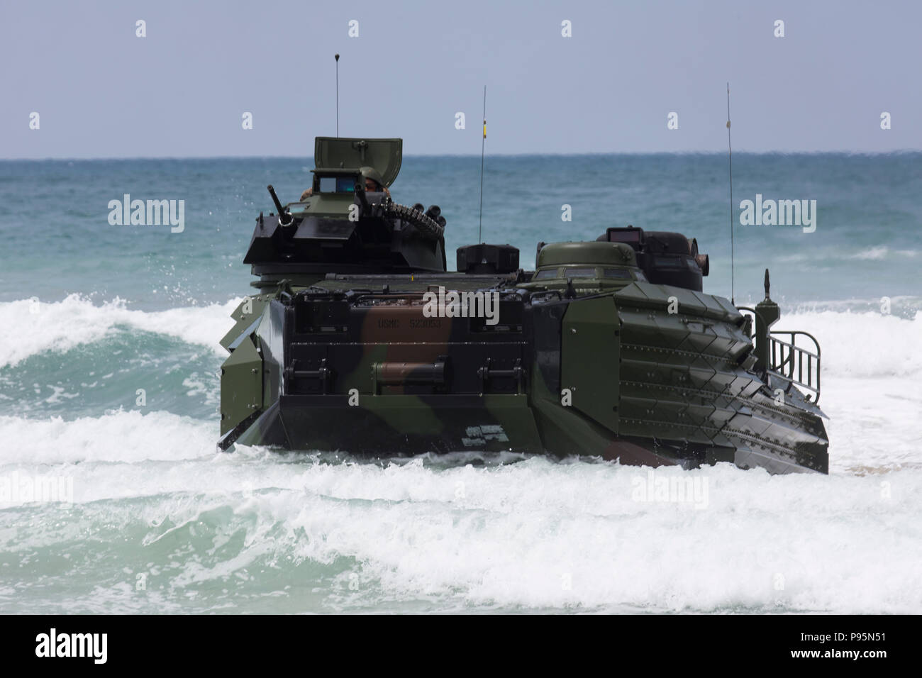 180713-M-PG096-1035 MARINE CORPS BASE CAMP PENDLETON, Calif. (July 13, 2018) A U.S. Marine Corps AAV-P7/A1 assault amphibious vehicle approaches the shore during an amphibious raid as part of Rim of the Pacific (RIMPAC) exercise on Marine Corps Base Camp Pendleton, California, July 13, 2018. This evolution provided an opportunity for participating nations to share best practices which included loading and unloading drills as well as squad attacks. RIMPAC demonstrates the value of amphibious forces and provides high-value training for task-organized, highly capable Marine Air-Ground Task Forces Stock Photo