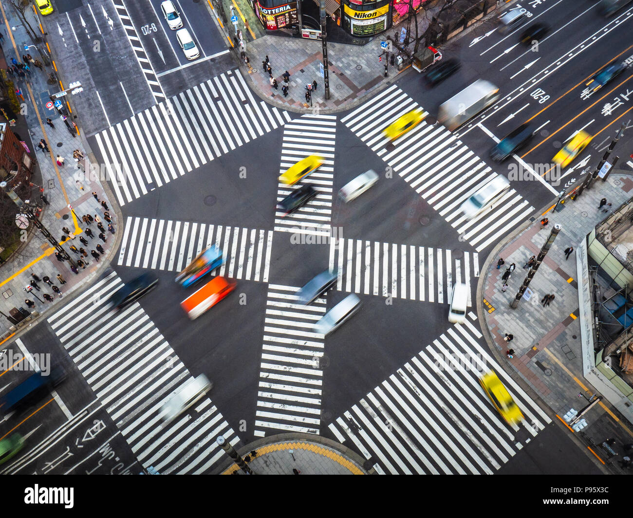 Tokyo Traffic Tokyo Crossing - Cross Town Traffic in Central Tokyo Japan. Tokyo Traffic in Motion. Motion Blur. Stock Photo