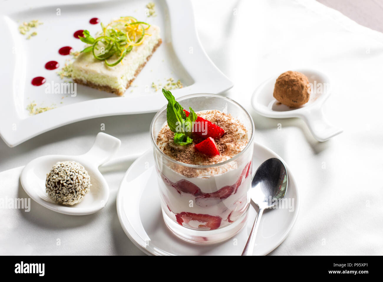 Sweet table with organic raw food desserts, sweets, yogurt with ...