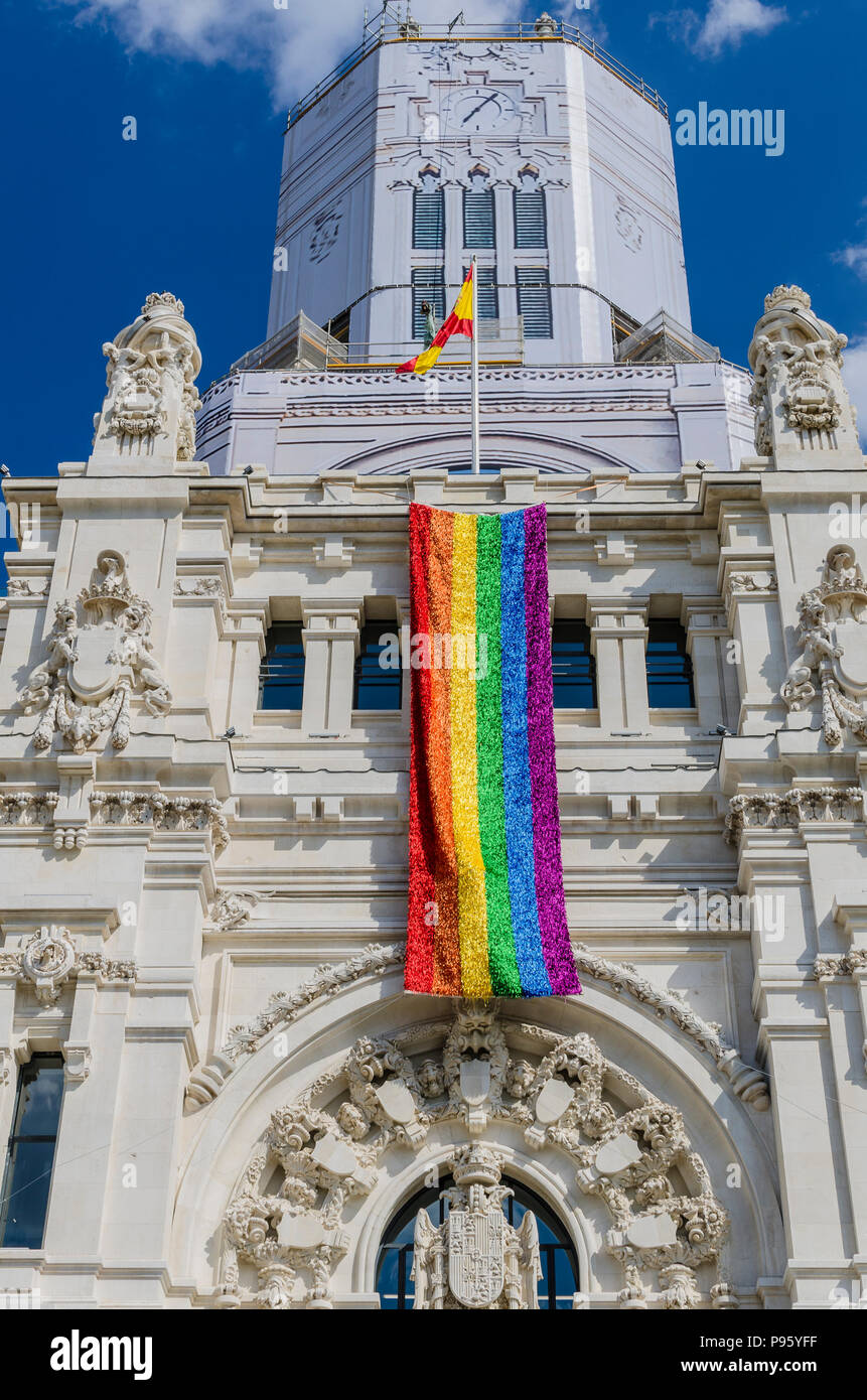 Rainbow flags fly from official buildings in Madrid and Valencia, Spain