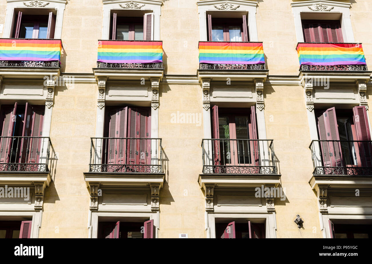 Rainbow flags fly from official buildings in Madrid and Valencia, Spain