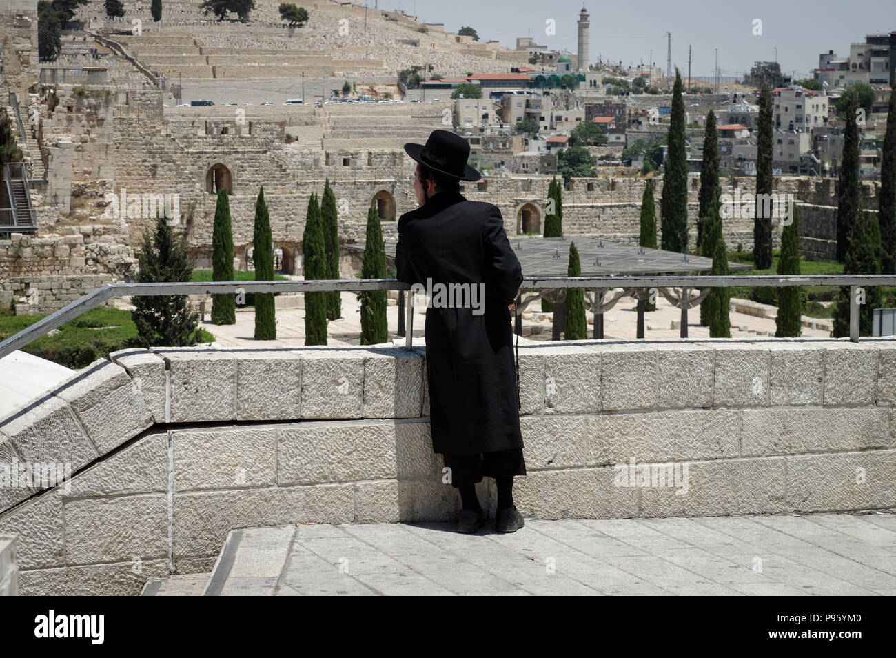 Orthodox Jewish Man standing at the Western Wall Stock Photo