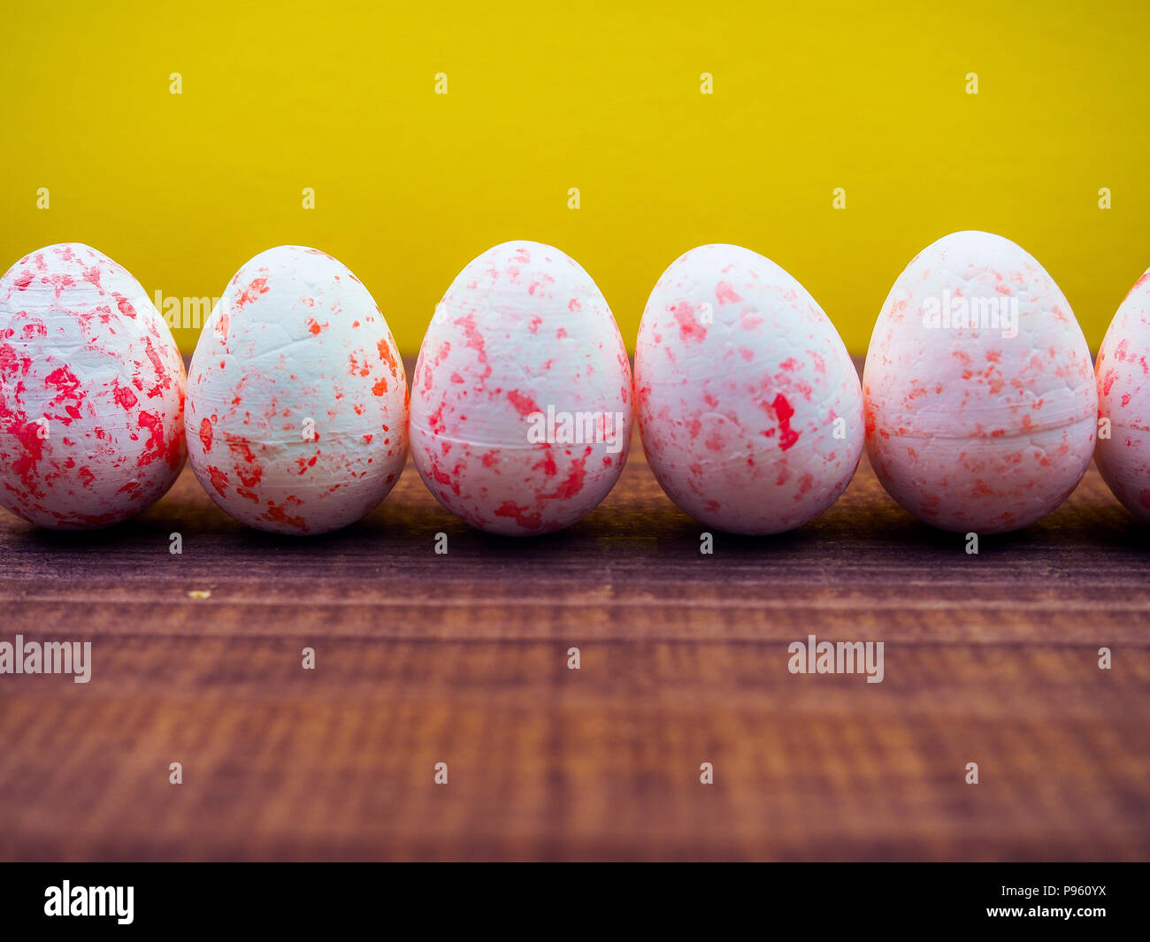 colored eggs for Easter on a bright yellow background copy space for colored eggs for Easter on a bright yellow background copy space for