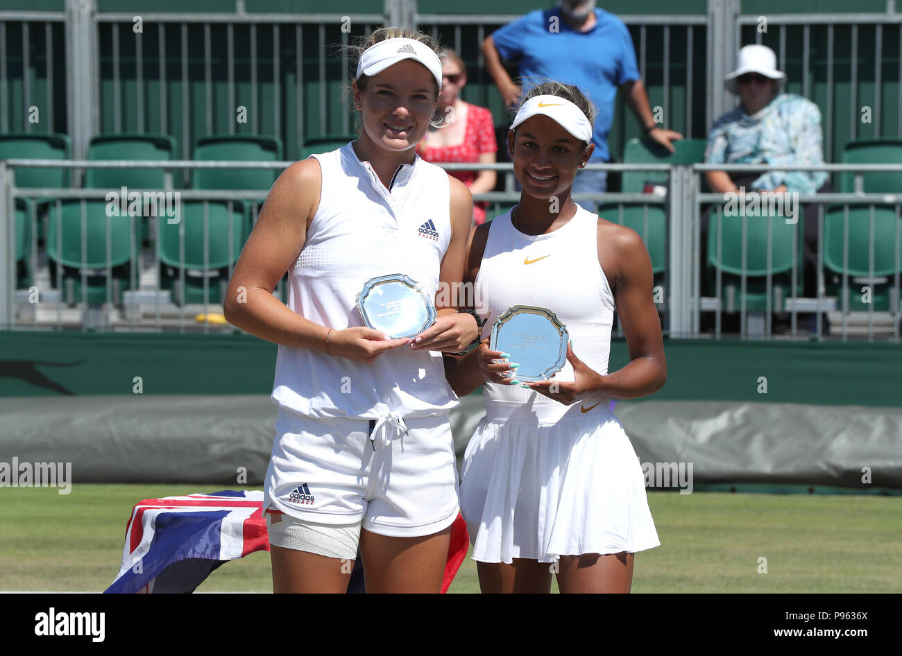 Caty Mcnally (left) and Whitney Osuigwe (right) with the runners up trophy in the Girls Doubles Final on day thirteen of the Wimbledon Championships at the All England Lawn Tennis and Croquet
