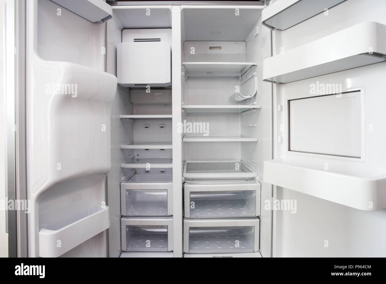 White open empty refrigerator. Weight loss diet concept Stock Photo Alamy
