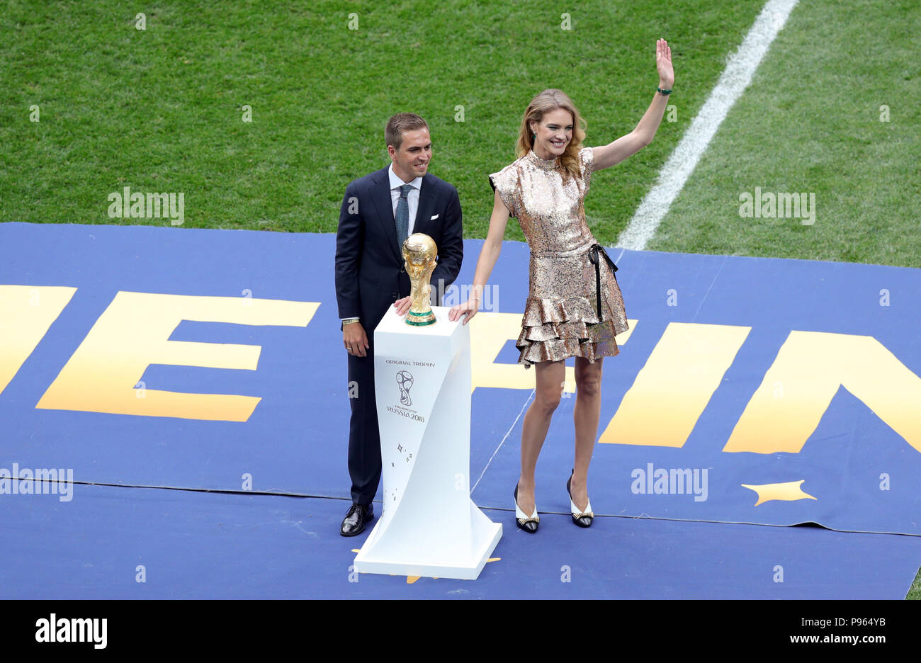 Former Germany captain Philipp Lahm and Natalia Vodianova pose with the world cup trophy prior to the FIFA World Cup Final at the Luzhniki Stadium, Moscow. Stock Photo