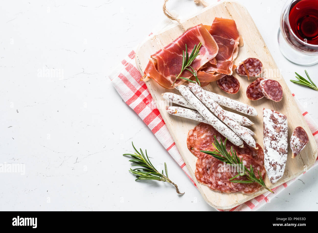 Antipasto. Traditional italian antipasto, sliced meat, appetizer on wooden cutting board on