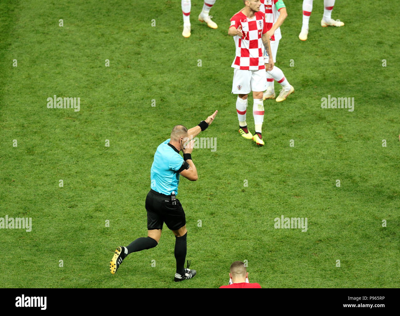 Match referee Nestor Pitana gives a penalty after consulting the VAR System during the FIFA World Cup Final at the Luzhniki Stadium, Moscow. Stock Photo