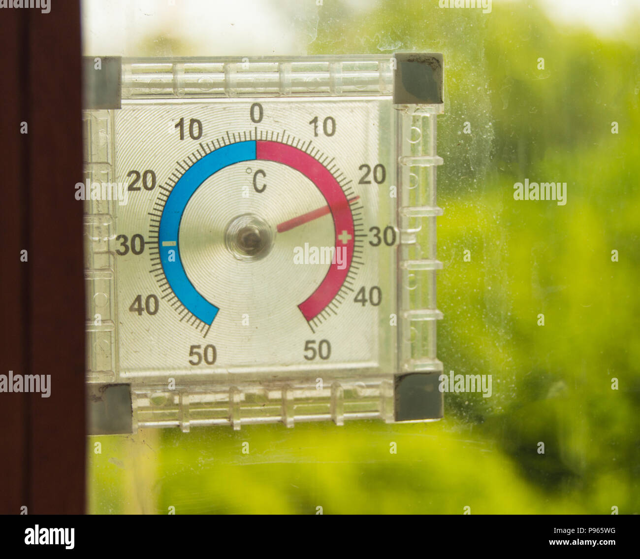A Thermometer Of Temperature Outside The Window That Hangs On The Window In  The House Stock Photo - Download Image Now - iStock