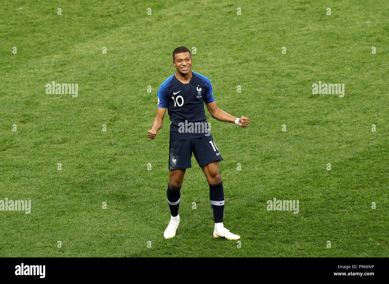 France's Kylian Mbappe celebrates scoring his side's fourth goal of the game during the FIFA World Cup Final at the Luzhniki Stadium, Moscow. Stock Photo