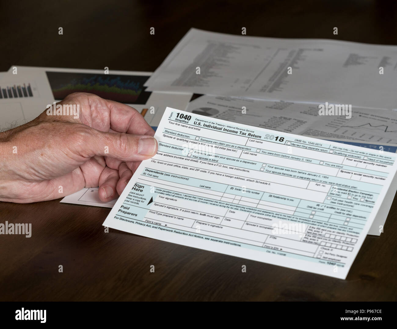 Form 1040 Simplified allows filing of taxes on postcard Stock Photo