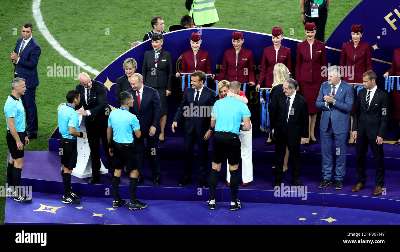 Match referee Nestor Pitana leads the team of officials up to receive their medals after the FIFA World Cup Final at the Luzhniki Stadium, Moscow. Stock Photo