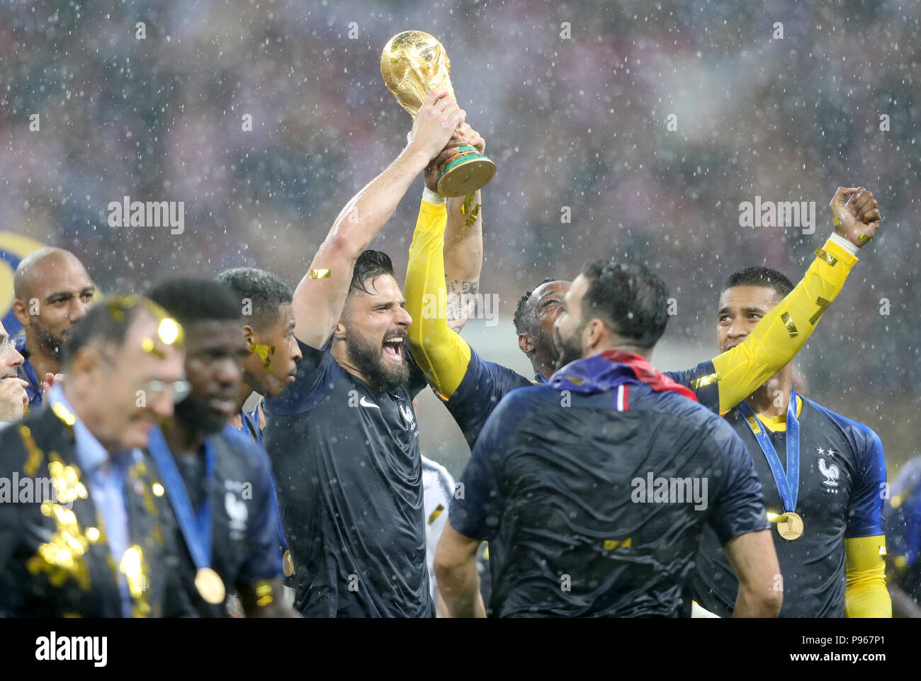 France's Olivier Giroud celebrates with the trophy after winning the FIFA World Cup Final at the Luzhniki Stadium, Moscow. Stock Photo