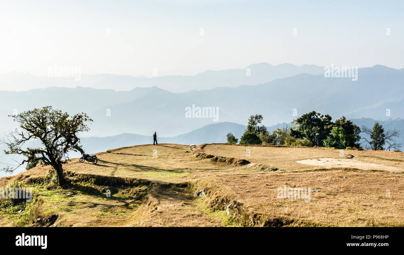Man having a walk on Sarangkot hill, Pokhara, Nepal Stock Photo