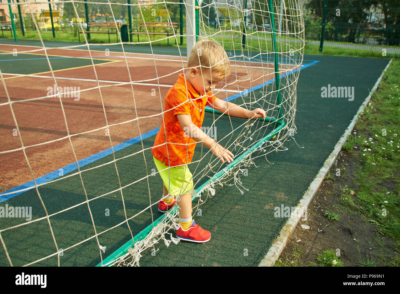 little boy on playground Stock Photo