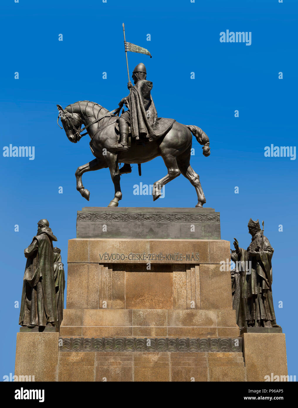 The bronze equestrian statue of St Wenceslas at the Wenceslas Square , Prague, Czech Republic, bright sun, blue sky Stock Photo